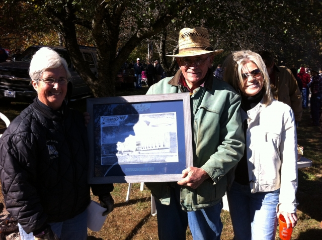 Vic and Gail Campbell and Daughter with Avondale Print.